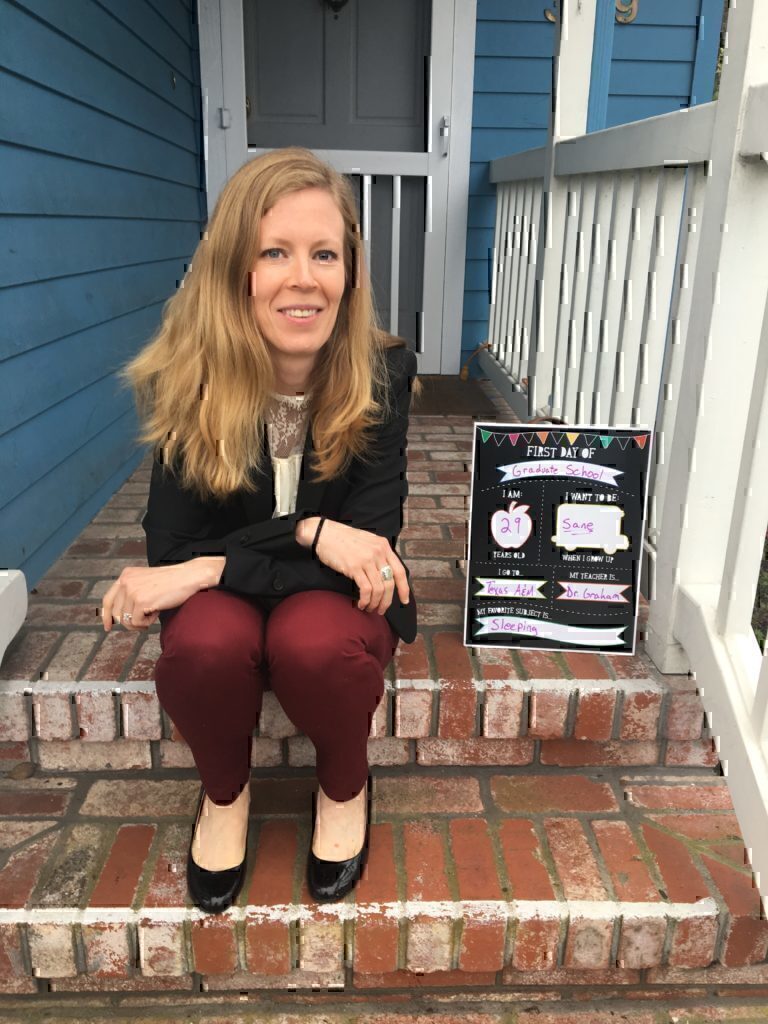 Jennifer Barnhill sitting on her porch, waiting to start her first day of the semester as a Masters student.