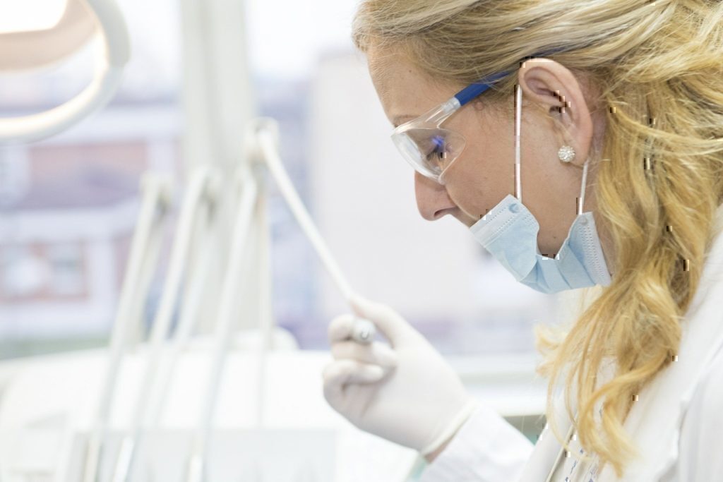 A healthcare worker processing through the day's work.