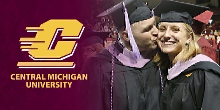 Global Campus students Michael and Carla Van Horn travelled from Maryland to walk and get their degrees Saturday during commencement ceremonies at Central Michigan University in November 2014. Photo by Steve Jessmore/Central Michigan University