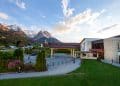Family overlooking the Bavarian Alps from Edelweiss Lodge and Resort balcony