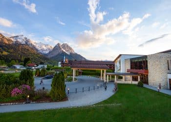 Family overlooking the Bavarian Alps from Edelweiss Lodge and Resort balcony