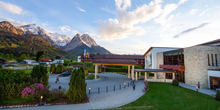Family overlooking the Bavarian Alps from Edelweiss Lodge and Resort balcony