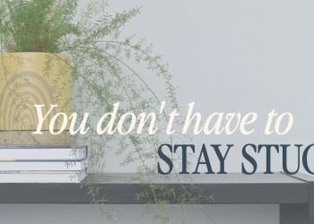 Plant in a yellow pot sits on a stack of books on a shelf, overlaid with the quote “You don't have to stay stuck.”