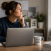 Military spouse entrepreneur working on her business from home